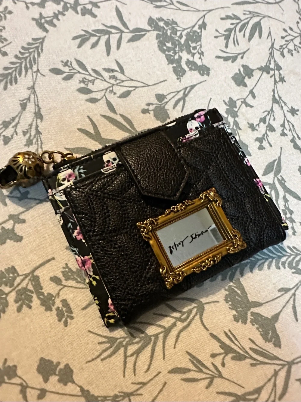 Betsey Johnson Black Floral Skull Zip Card Wallet with Gold Frame Accent